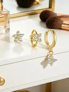 Crystal four-leaf clover stackable earring set, featuring a variety of lucky charm accessories and elegant golden ornaments, suitable for both casual and formal occasions