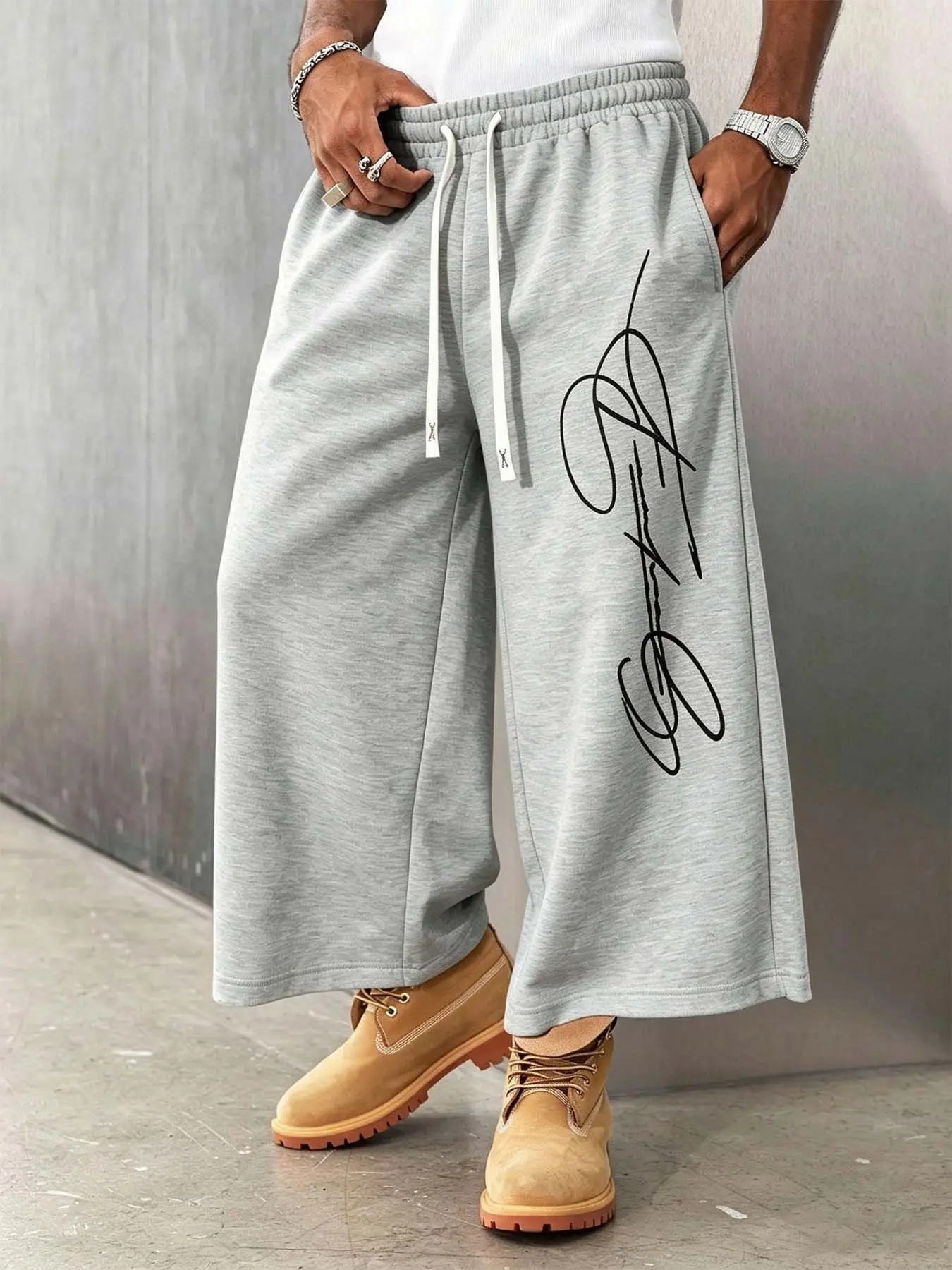 Men's fashion abstract line pattern loose sweatpants, double drawstring high-waist elastic wide-leg cropped pants, Y2K hip-hop style that can be paired with boots for everyday OOTD #streetstyle #loosepants #mensfashion