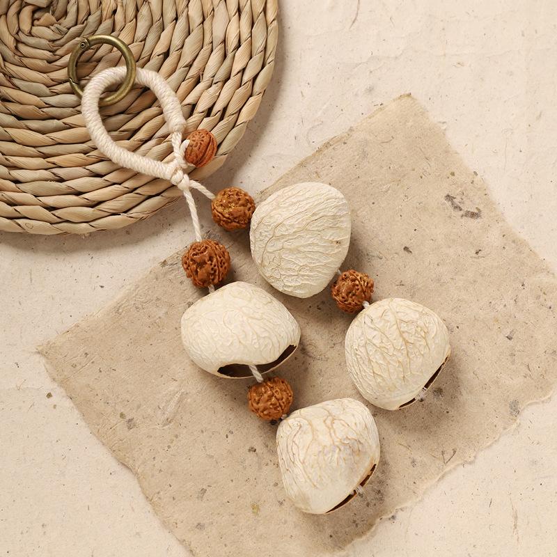 Naturally handcrafted fruit shell bell, with seeds, sound therapy handbell, wish-fulfilling fruit bag ornament, Yunnan specialty gift, mobile phone decoration accessory