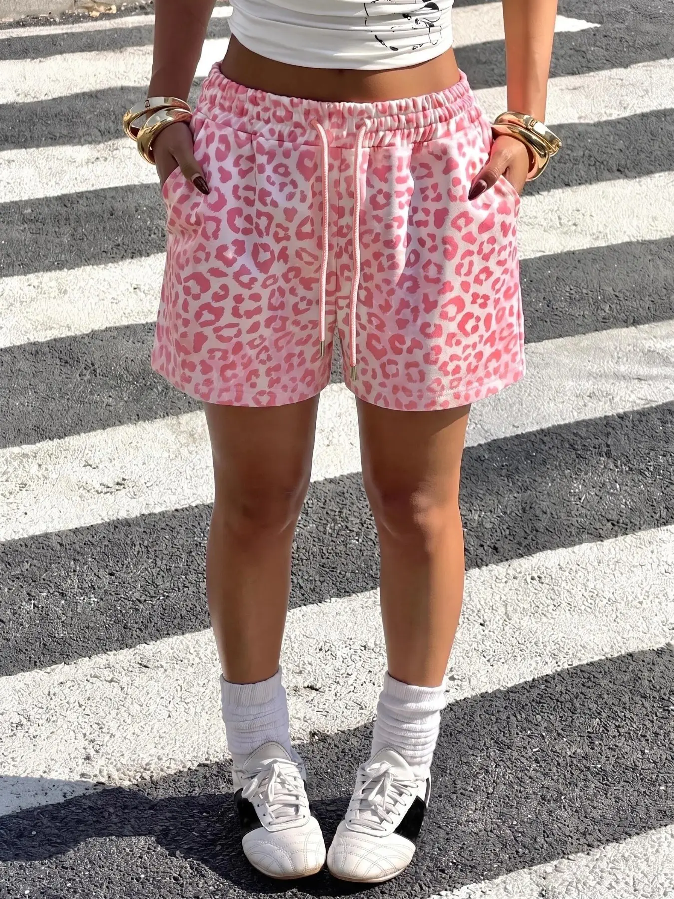 Pink leopard print sporty versatile shorts, Sports fitness shorts, with drawstring elastic waistband and pockets. Y2K style, sweet and cool vibe. Soft and comfortable fabric, suitable for summer home wear, fitness, and street style, summer essential