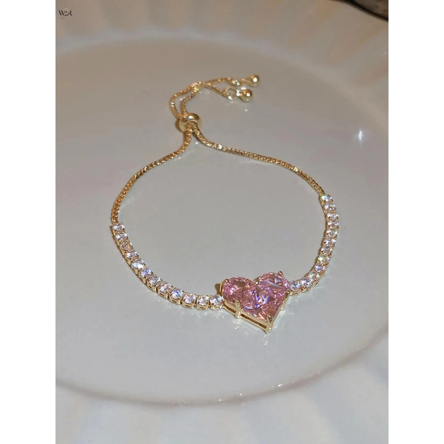Women's Dainty Look Sparkly Pink Cubic Zirconia Heart Crystal Stones Gold-Tone Tennis Slider Bracelet - 5g, 17-23cm Adjustable Size, Romantic Wear, One Size Fits All Costume Jewelry