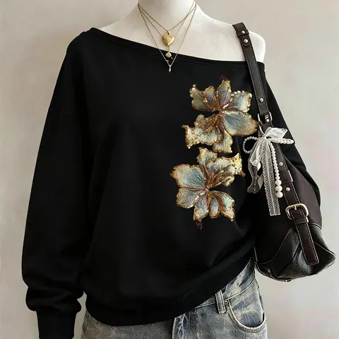 Fashionable off-shoulder black sweatshirt with luxurious gold floral embroidery, trendy and elegant casual street style, perfect for everyday gatherings, dates, weekend outings, and home wear #AutumnOutfit #OffShoulderTop #FloralEmbroideredSweatshirt