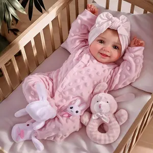 17inch Cute and soft vinyl realistic baby doll, poseable, with a bright smile, complete with accessories, suitable as a gift for children over 3 years old: toys and games