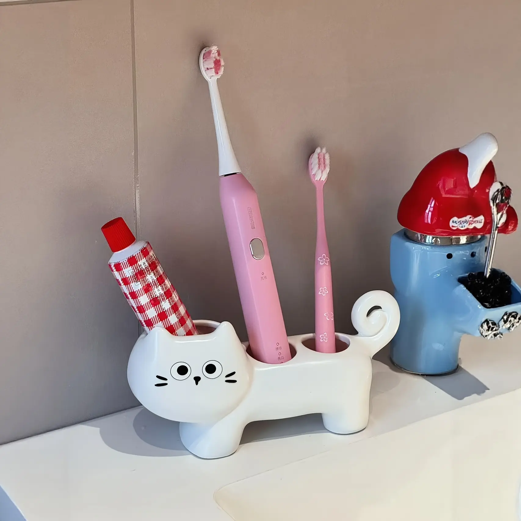 Creative and Whimsical Cat-Shaped Toothbrush Holder, Ceramic Organizer Base for Bathroom Vanity Countertop - Suitable for Toothbrushes and Dental Care, Space-Saving Countertop Storage, Toothbrush Stand for Bathrooms, Fun Design, Sturdy Construction