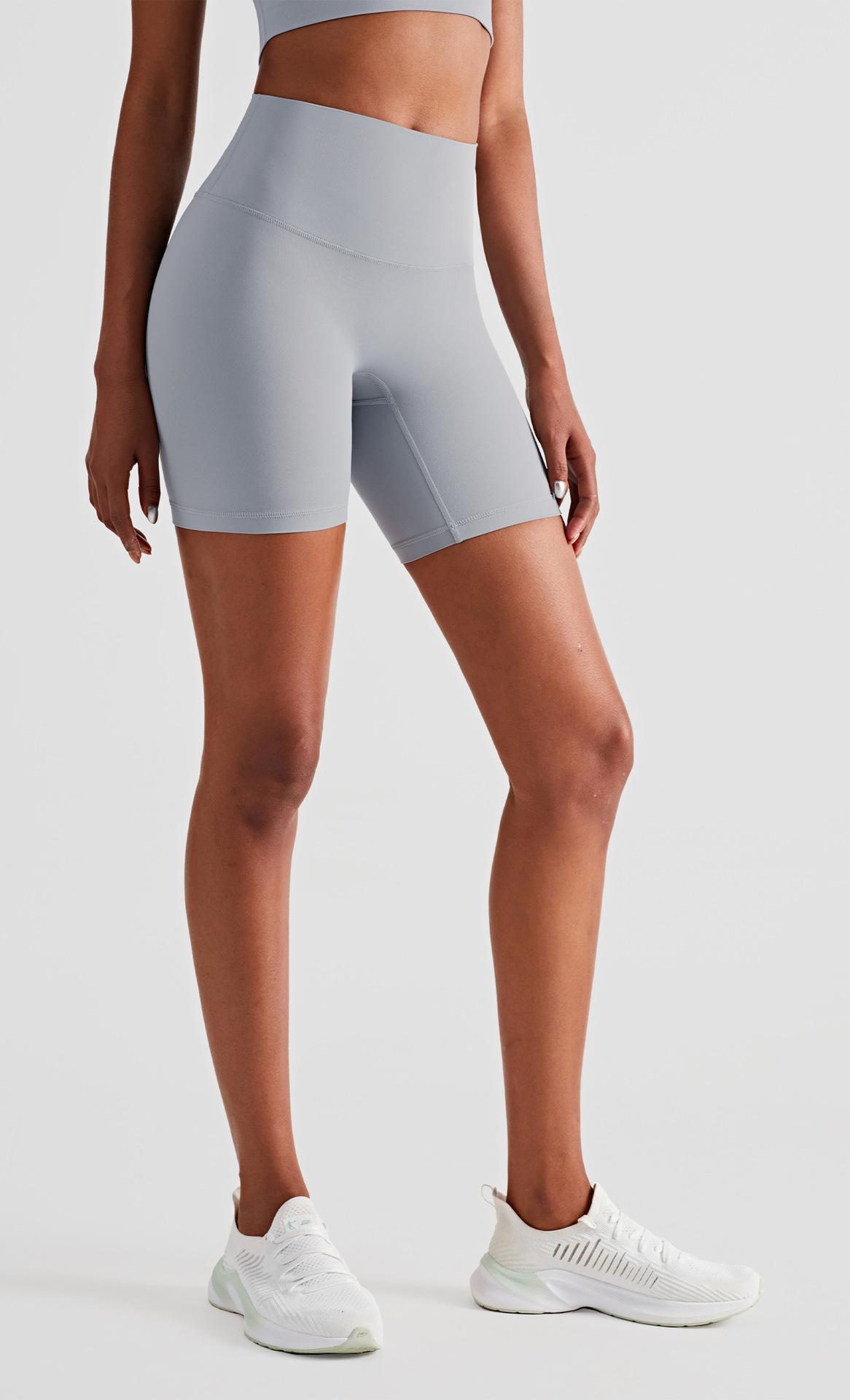 Spring and summer nude-feel running sports shorts for women, high-waisted, tummy-tightening, butt-lifting, three-quarter length pants for fitness, outdoor cycling, and yoga