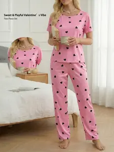 Two piece women's loungewear set short sleeve long pants pink heart print pattern Valentine's Day gift holiday gift home outings dinner parties.