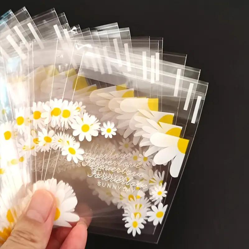 100pcs daisy print gift bag, transparent self-adhesive small packaging bag suitable for wedding return gifts, birthday tea parties, small gift packaging, independent packaging bags for biscuit baking all year round