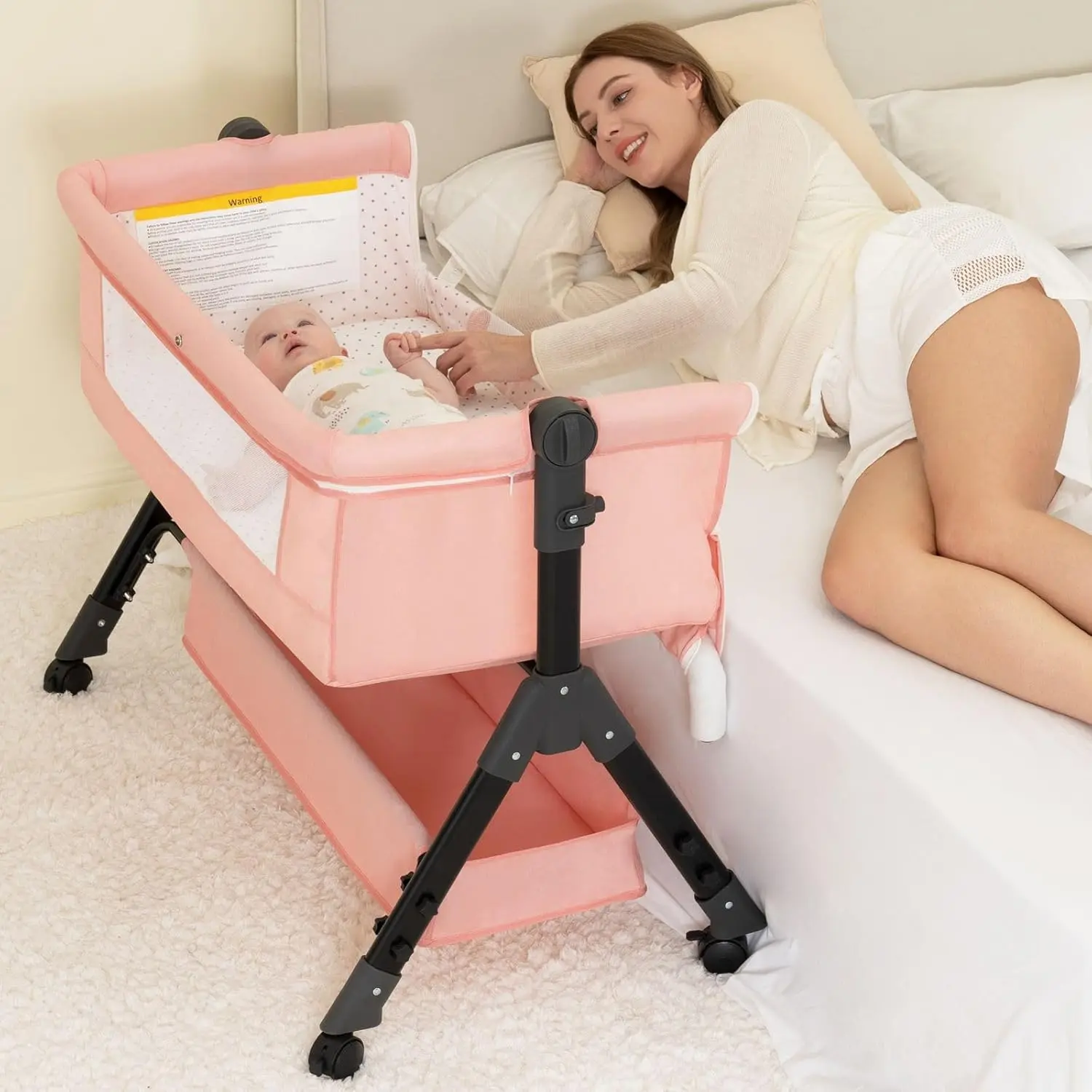 Baby  Sleeper,  Baby Crib, Rocking  Bedside Sleeper, Easy to Fold Portable Crib Side  with Breathable Mesh and Wheels (Pink) Adjustable