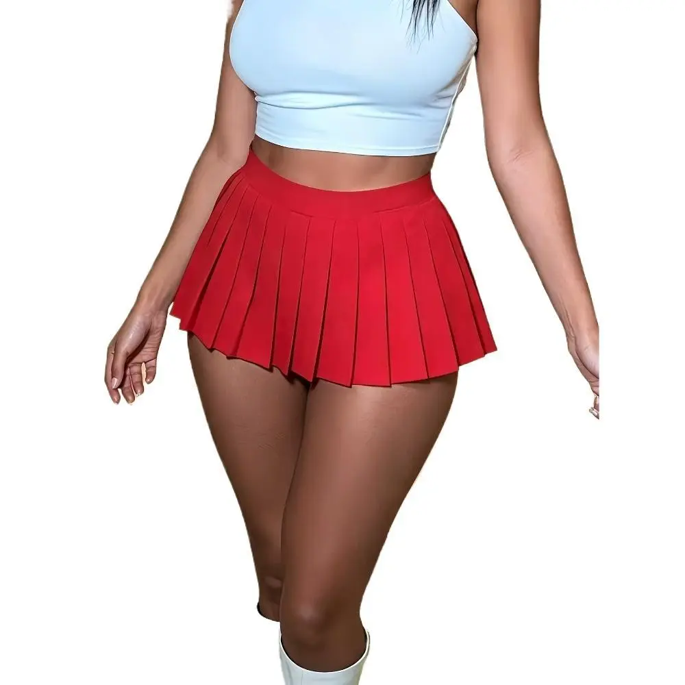 This high-waisted pleated mini skirt features a bold red color and sharp, evenly spaced pleats that create a flirty, flowy silhouette. The ultra-short length and high-rise waist accentuate curves, making it perfect for a Y2K, coquette, or night-out aesthe