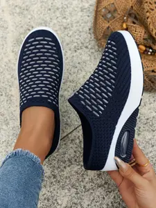 Women’s Hollow Grid Knit Backless Wedge Mule Sneakers, Slip On Closed Toe Casual Walking Clogs with Cutout Knit Uppers and Two-Tone Wedge Outsoles for Daily Errands, Outdoor Leisure and Everyday Casual Outfits
