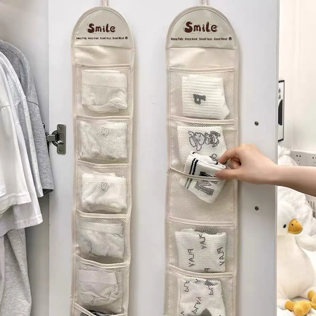 Hanging Organizer for Underwear and Socks – A Wardrobe Storage Essential. Multi-layer over-the-door storage pockets featuring an extended design for increased capacity; made with breathable mesh that is dust-proof, moisture-resistant, and odor-free.