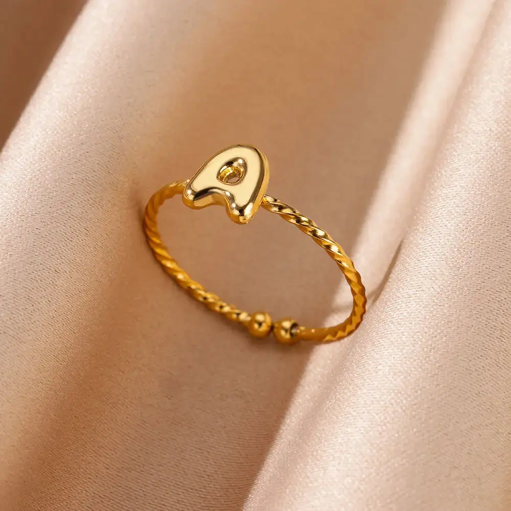 Stainless steel plated with 18k real gold, 26 English letter rings, smooth surface, open-ended finger rings