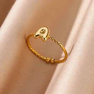 Stainless steel plated with 18k real gold, 26 English letter rings, smooth surface, open-ended finger rings
