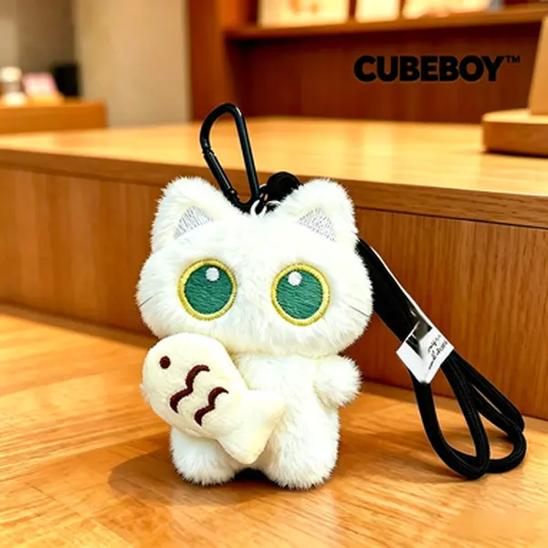Cute yet silly black cat plush toy couple bag pendant holding small fish, creative cat keychain
