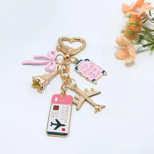 Trendy Travel Themed Alloy Keychain with Airplane & Bow Charms, Aesthetic Trip Pendant Bag Charm, Stylish Car & Backpack Accessory for Travel Lovers