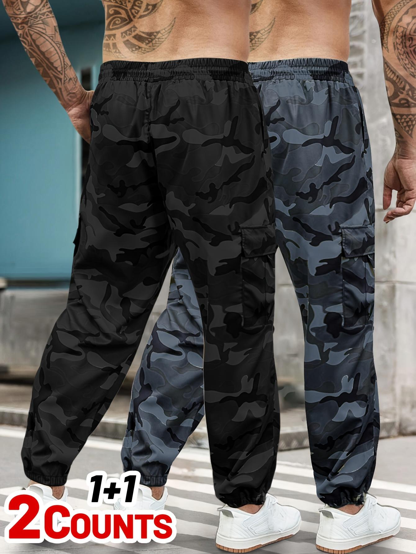 Men's 2-piece camouflage workwear, ankle tied casual pants Multi pocket drawstring elastic waist loose sports work pants two-piece set Outdoor military style camouflage work pants 2-piece combination Men's 2-piece camouflage workwear, ankle tied casual pants Multi pocket drawstring elastic waist loose sports work pants two-piece set Outdoor military style camouflage work pants 2-piece combination