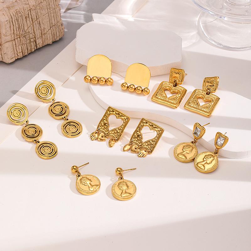 Geometric earrings for women, featuring a heart-shaped original design. These light luxury earrings are made from gold coins and titanium steel, and are suitable for everyday wear without easily fading in color.