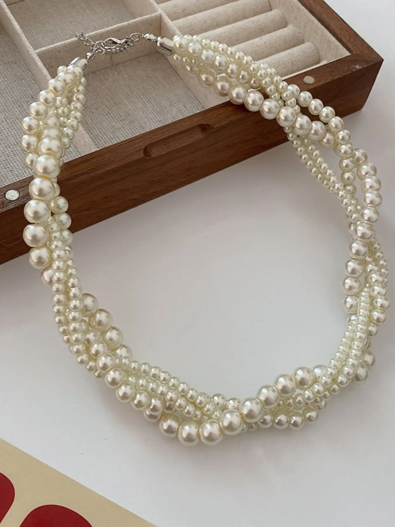 💫 No more layering hassle! This multi-strand pearl choker gives you the stacked look in one second #layerednecklace #pearljewelry #everydaychic