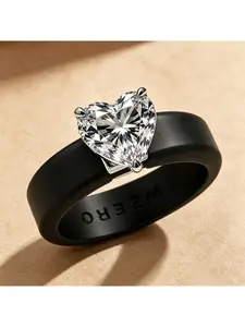 A black silicone ring with a three-prong heart-shaped 3A zircon, featuring a sweet and cool design. It's light luxury and niche, perfect for daily wear, commuting, and dates. Can be given as a Valentine's, birthday, or holiday gift for a girlfriend.