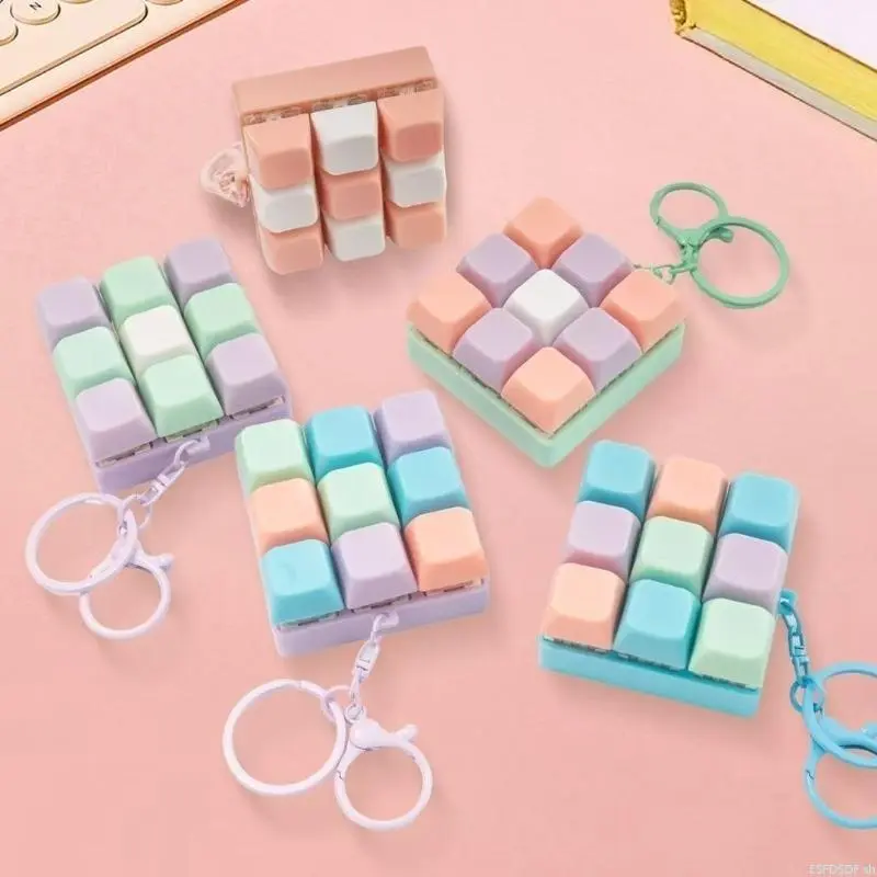 Mechanical Switch Stress-Relief Keychain — A portable, tactile fidget accessory featuring a square, press-action mechanical switch; designed for keyboard enthusiasts, students, and professionals.