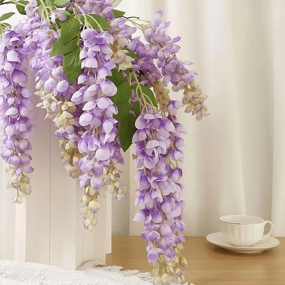 Four 47-inch artificial purple vine hanging floral arrangements, with realistic hanging flower stems, creating a spring-like atmosphere. They can decorate your home garden or be used for outdoor wedding archway ceremony setups.