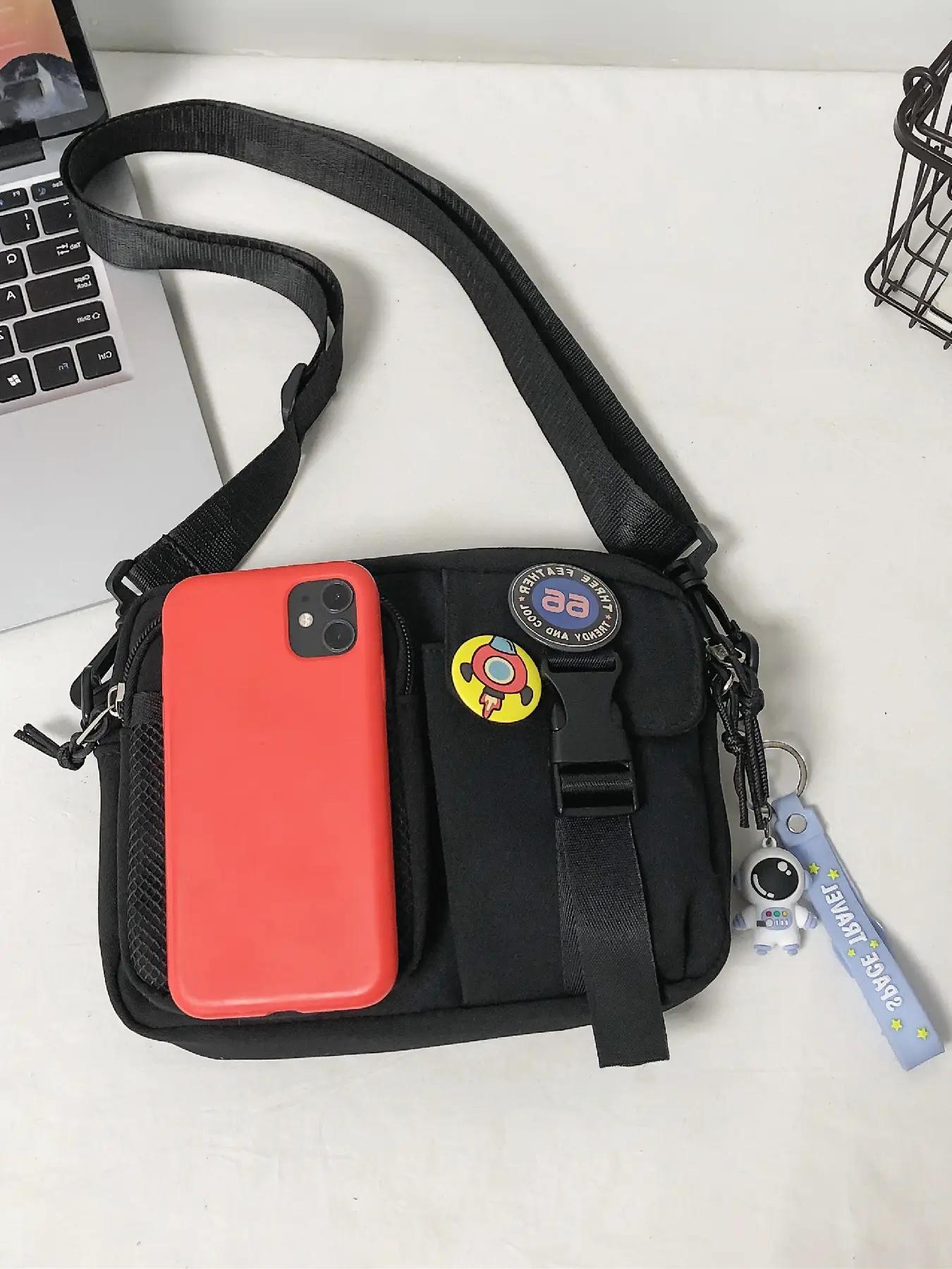 Unisex Casual Plain Color Release Buckle Crossbody Bag with Astronaut Charm, Fashionable Versatile Zipper Crossbody Bag with Random Color Badge, Trendy Shoulder Bag for Daily Use, Casual Messenger Bags, Stylish Crossbody Bags