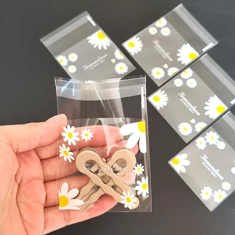 100pcs daisy print gift bag, transparent self-adhesive small packaging bag suitable for wedding return gifts, birthday tea parties, small gift packaging, independent packaging bags for biscuit baking all year round
