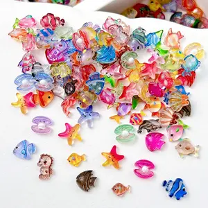 100PCS Translucent Luminous Simulated Ocean Series Nail Charms 3D Multiple Style Kawaii Small Expressions Starfish Seahorse Fish Shell Dolphin Mixed Nail Art Decorations DIY Summer Beach Nails Accessories