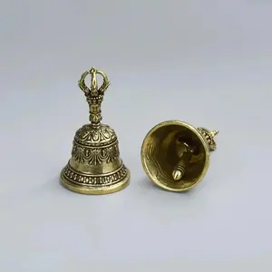 Handcrafted Carved Bronze Hand Bell With Clapper Handle, Premium Handheld Shaker Bell Delivering Soft Calming Tones For Meditation Relaxation, Multi-Purpose Ornament Suitable For Ceremonies Weddings Schools Festivals And Outdoor Holiday Gifts