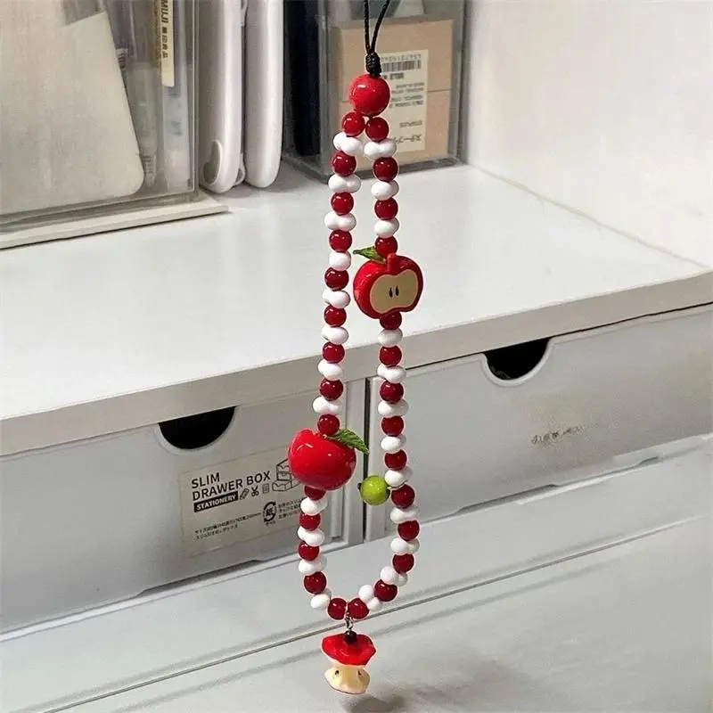 Dainty Aesthetic Apple Pearl Beaded Phone Charm and Lanyard - Cute Fruit Motif with Anti-Lost Wrist Strap and Keychain Compatibility for iPhone and Samsung, Chic Handcrafted Accessory, Perfect for Daily Phone Styling, Purse Decoration & Selfie Prop