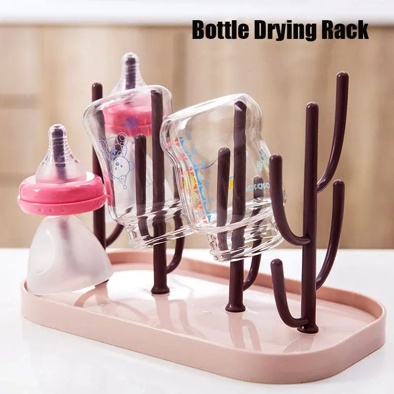 1 kitchen countertop, a must-have for babies, a detachable bottle drain stand with a base, a nipple, and a bottle cup that can be used
