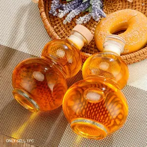 New creative ginseng fruit wine dispensing bottle, milk tea cold brew bottle, sealed glass wine bottle for infusing liquor, trendy gourd-shaped wine bottle.