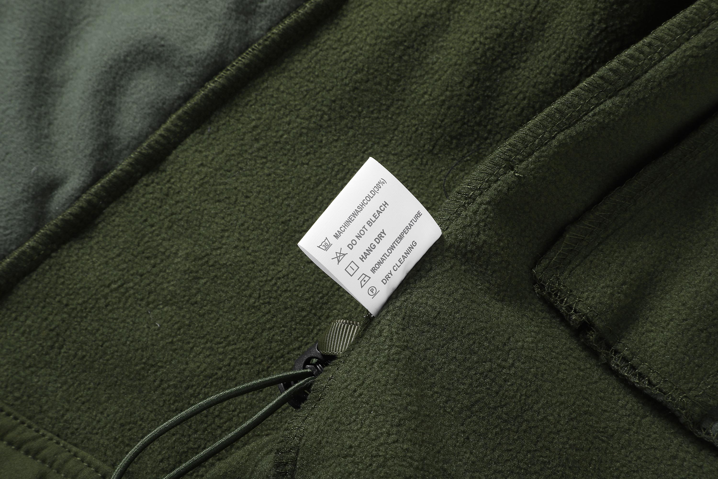 A men's hooded jacket with an outdoor and functional style features multiple zipper pockets distributed on the chest, arms, etc., making it convenient to store various small items and highly practical. Hood with drawstring closure