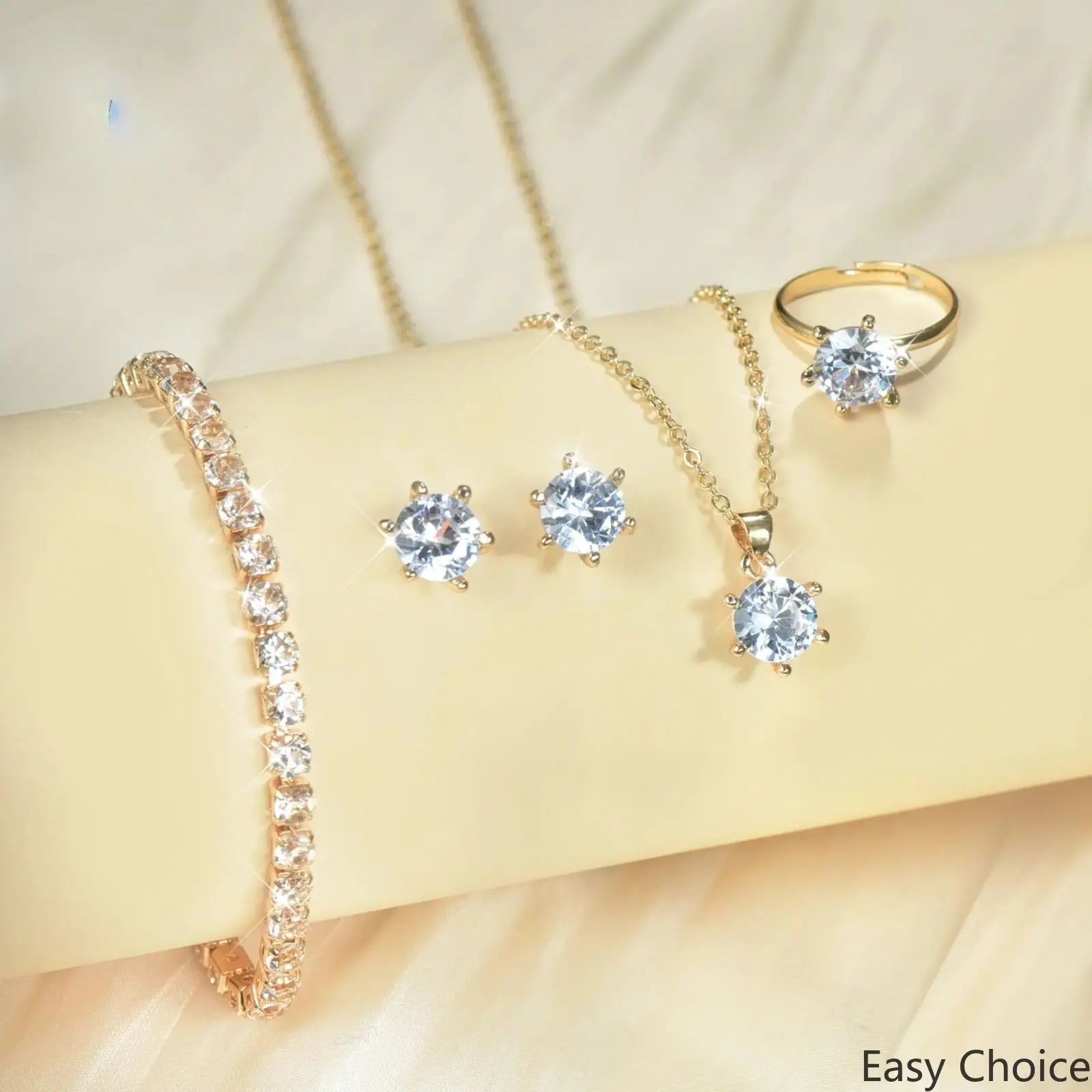 4-in-1 Gold Plated Sparkling Stone Jewelry Set, Includes Solitaire Necklace, Stud Earrings, Adjustable Ring & Tennis Bracelet, Elegant Matching Accessories, Glam Gift Option For Women At Weddings, Parties And Special Events