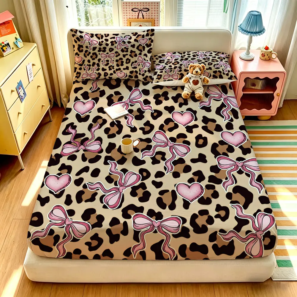 A 3-piece leopard-print heart bow-tie pattern printed bedding set, including 1 bedspread and 2 pillowcases, without a filling. The bedspread is soft and comfortable, with a deep pocket design, and it's perfect as a gift