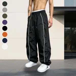 Men Convertible Hem Wide Leg Windbreaker Pants, Wrinkle-Free Thin Shell Trousers with Double Side Contrast Tape, Dual Drawstring Elastic Waist, Slant Hand Pockets for Skate Street Style