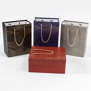 12-Piece Set of Gold-Embossed Wavy Gift Bags with Handles—Perfect for Wedding Favors and Valentine's Day Gifts, Featuring Elegant Gold Accents and Festive Designs
