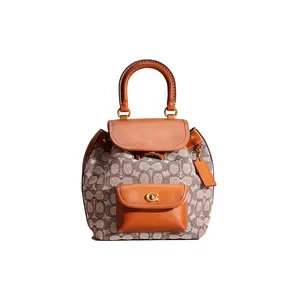 COACH Riya 23 Logo Toggle Drawstring Flap Classic Monogram Woven Leather Backpack, Medium, Women’s, Amber