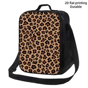 A single insulated bag featuring a leopard print design, set against a brown background with black spots. It comes equipped with a shoulder strap, is reusable, and is suitable for storing both hot and cold items. It is perfect for use at home, in the offi