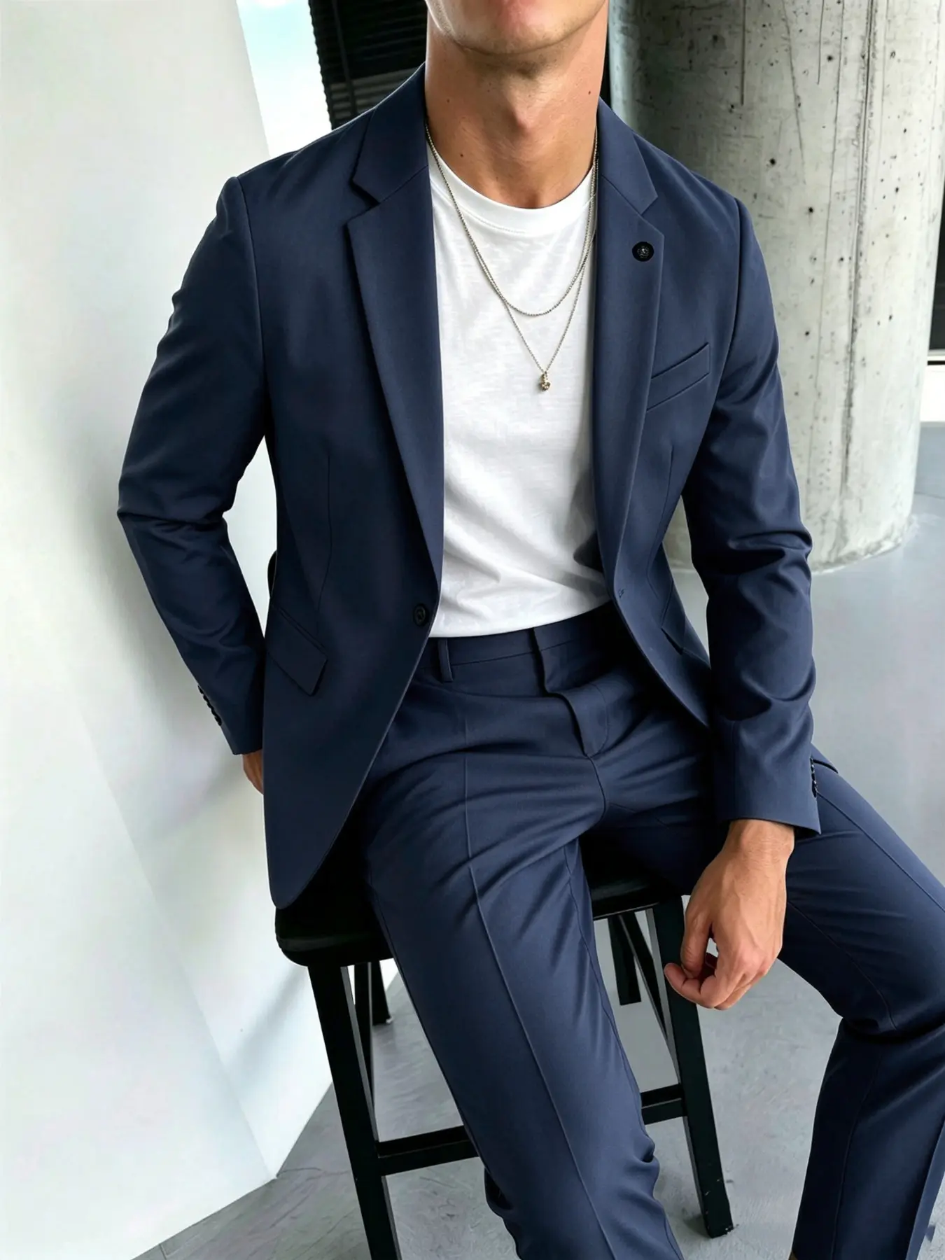 Men's suit set featuring a minimalist design and a textured fabric finish. This high-end, stylish suit boasts a slim, structured fit and is suitable for various occasions, including business meetings, social gatherings, dates, and weddings.