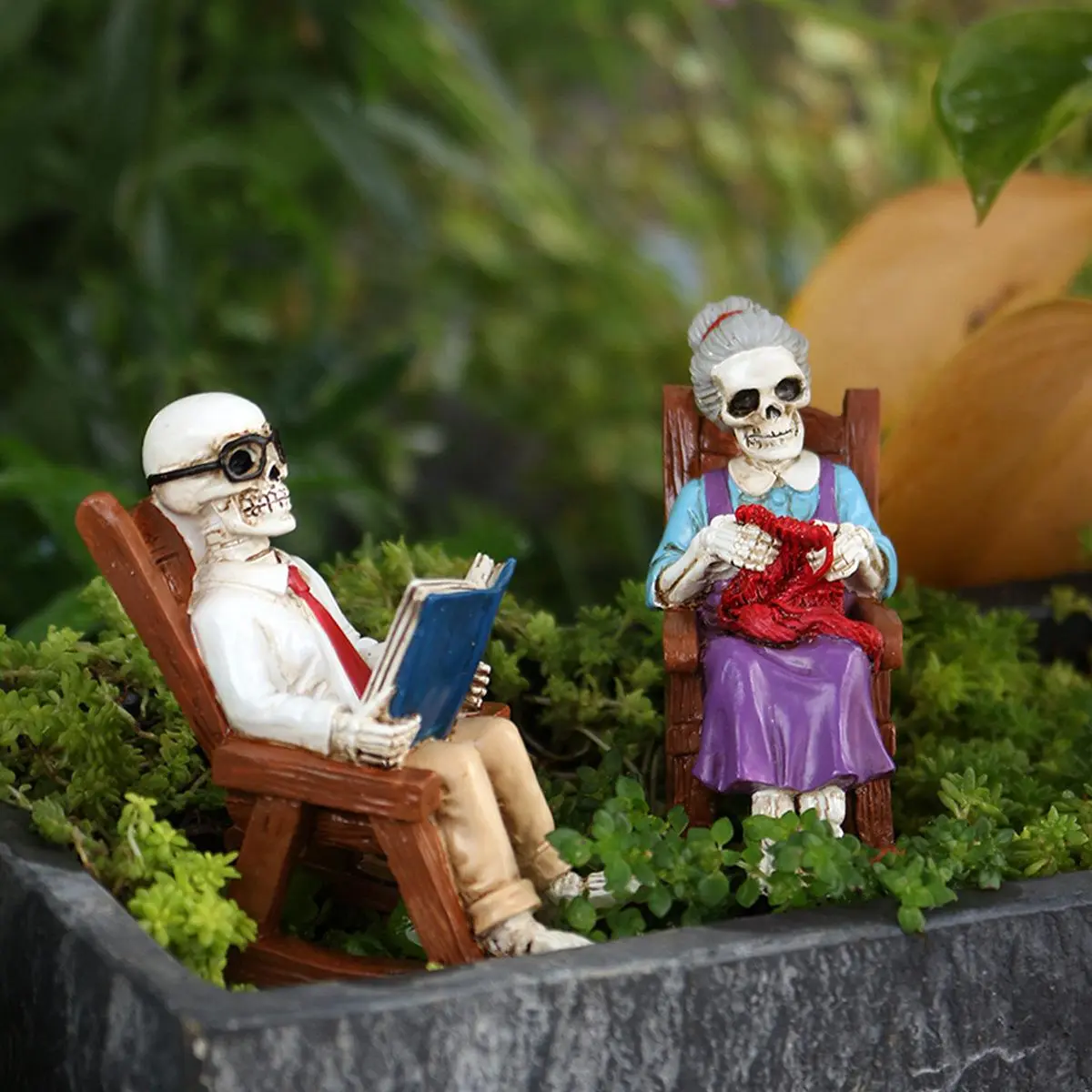 Set of 2 Mini Resin Skeleton Elderly Couple Figurines Sitting on Rocking Chairs, 2.75‑Inch Gothic‑Style Miniature Ornaments, “Love Never Dies” Themed Statue, Spooky Charming Tabletop Accent for Halloween Home Decor, Unique Novelty Gift for Couples