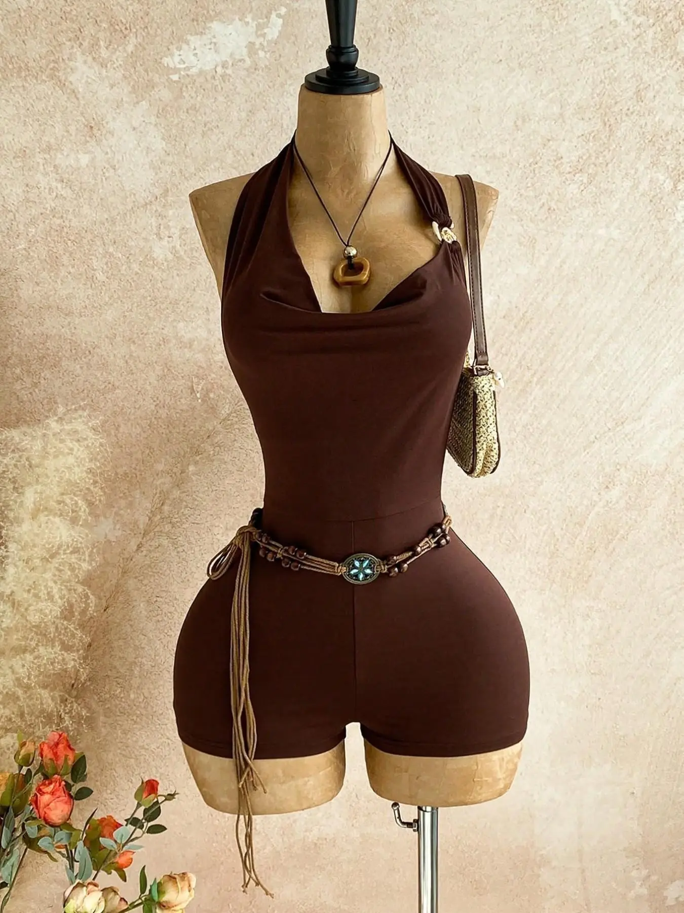 Brown Halter-Neck Romper Featuring A Vintage Bohemian Boho Chic Style, A Draped Neckline, And An Open-Back Design—Perfect For Beach Vacations, Dates, And Summer Outings.