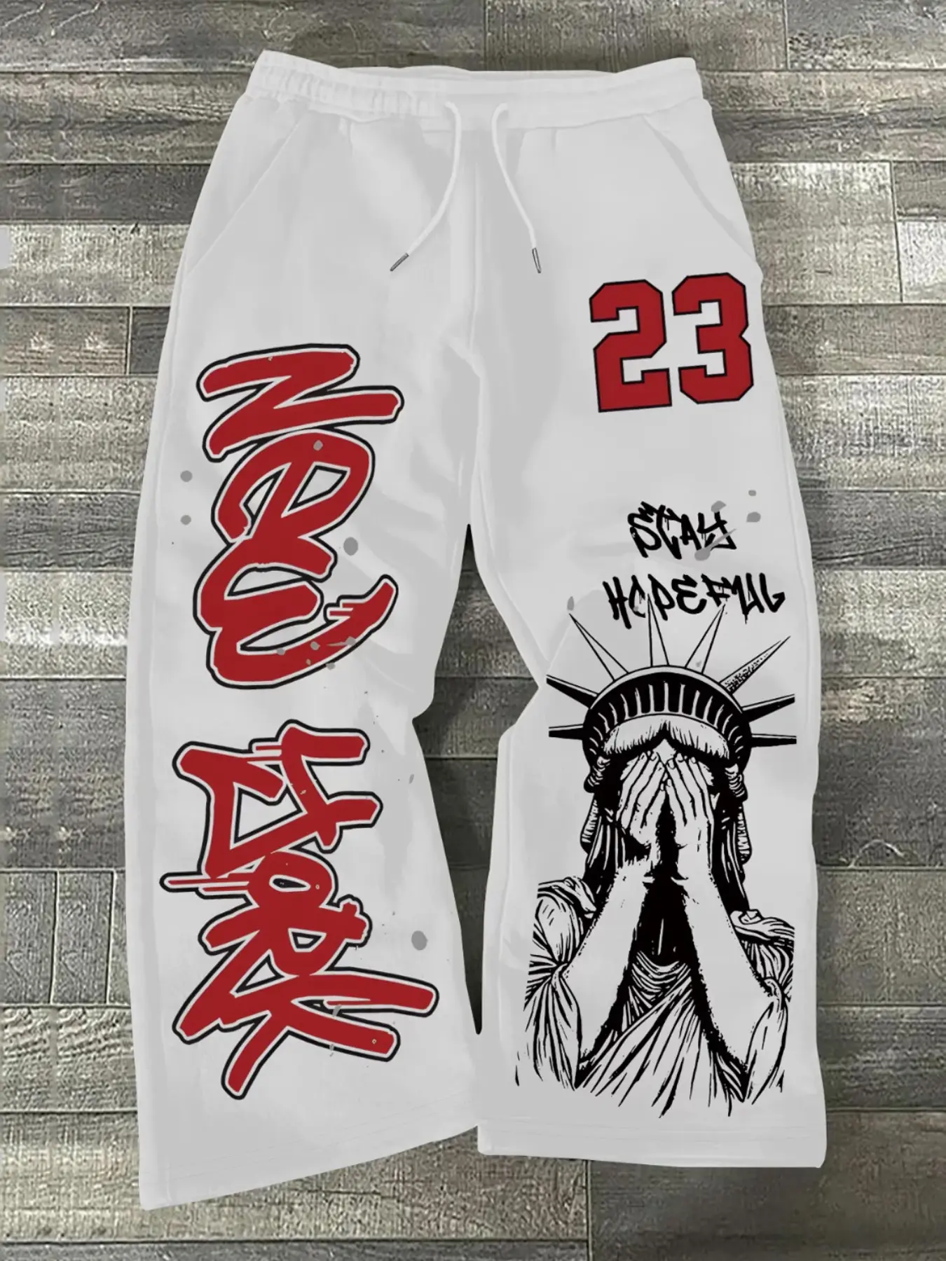 Men Elastic Drawstring Wide Leg Sweatpants, Graffiti Letter, Number 23 & Covered Face Statue of Liberty Graphic Print, Side Pocket Loose Hip Hop Streetwear Casual Sports Jogger Trousers #StatueLibertyPants #GraffitiSweatpants #HipHopStreetTrousers