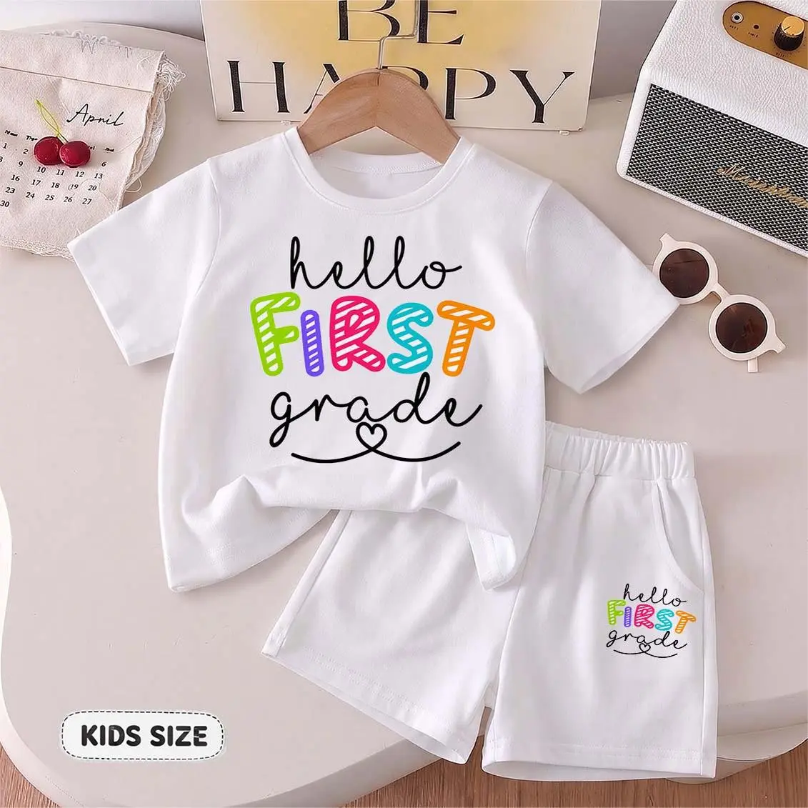 Kids’ "Hello First Grade” Cartoon Print Short-Sleeve T-Shirt And Shorts Set—Casual Summer Kids' Clothing. This Round-Neck Outfit Combination Is Perfect For Everyday Wear And Outdoor Play.