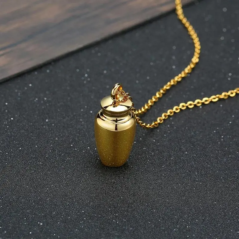 Handcrafted cremation urn necklace - crafted with Jesus design crystal metal, featuring initial letter details, an exquisite appearance, unisex clothing jewelry, and a fashionable American street style for daily graduation y2k accessories