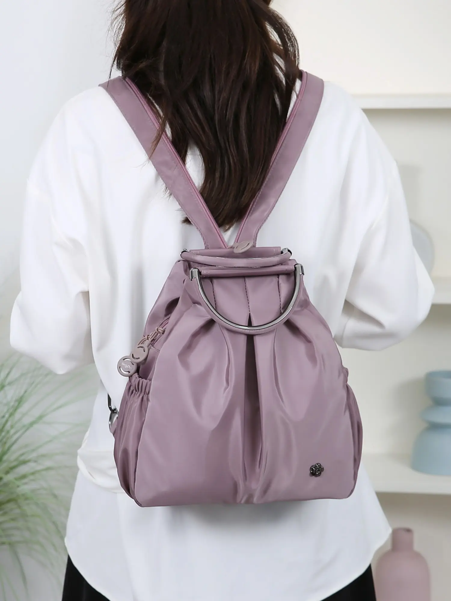 Foldable Nylon Dual-Use Backpack, Metal Ring Handle Design, Wide Comfort Strap, Side Drawstring Pouch, Multiple Zip Compartments, Lightweight Durable Fabric