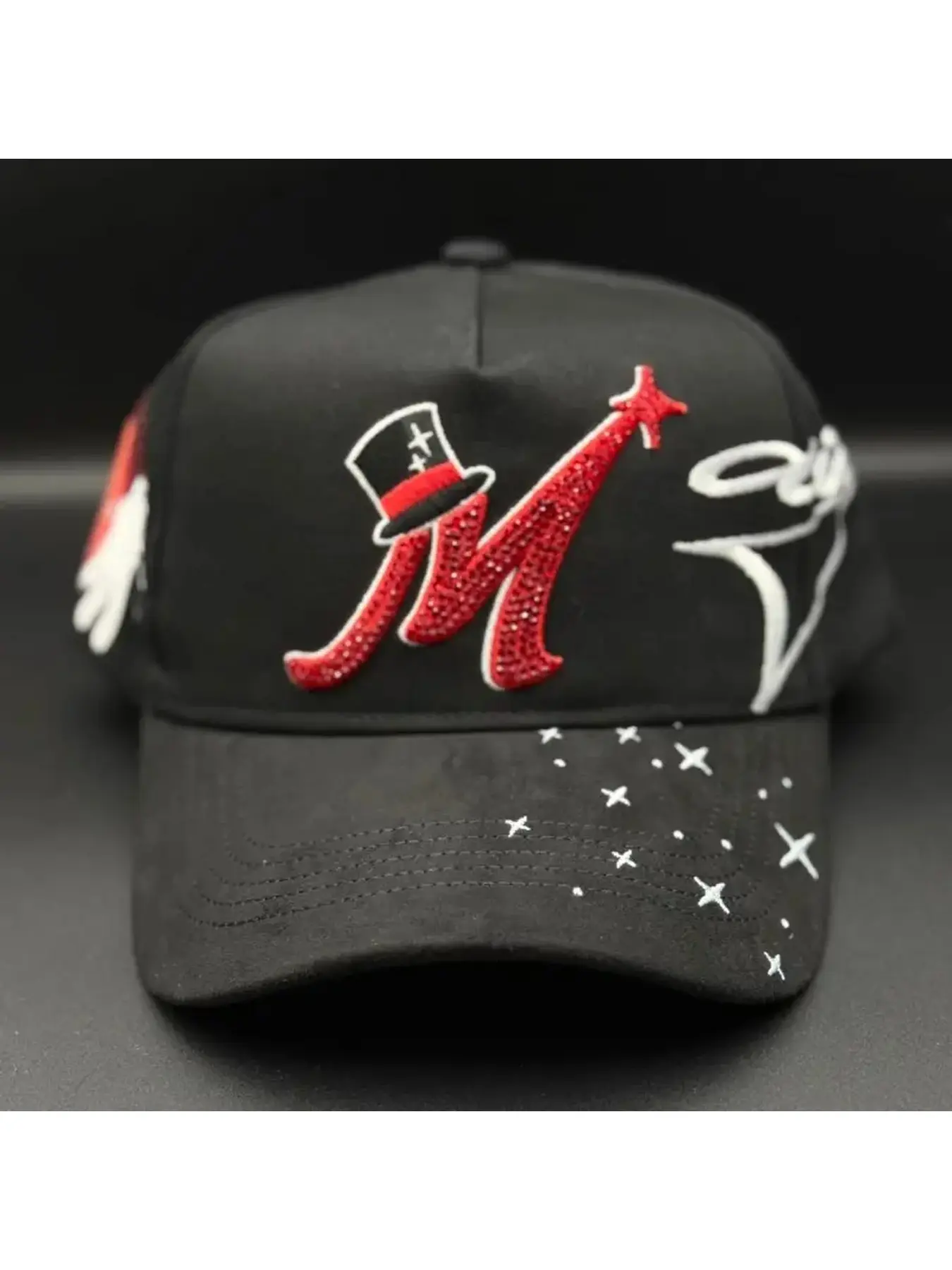 Daily hat selection. Quality 1:1. The hat features a red "M" design with white details on a black background.