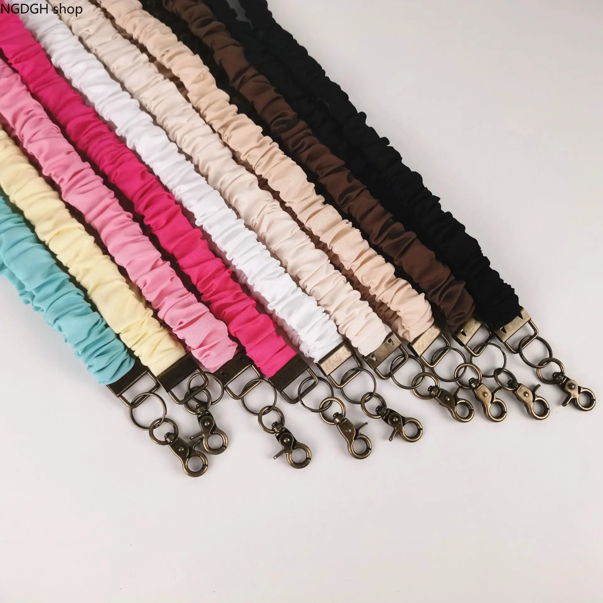 Black Scrunchie Phone Lanyard with Antique Bronze Swivel Clasp, Stretchy Fabric Wrist Strap for Keys & ID Badges, Minimalist Bag Charm Accessory, Stylish Anti-Drop Cord, Perfect for Daily Commute & Trendy Outfits.