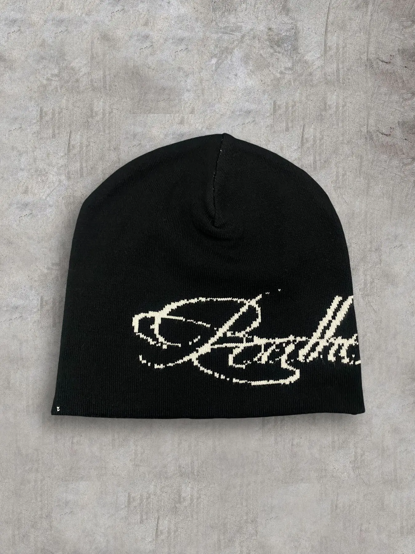A personalized letter jacquard knitted hat for autumn and winter cold resistant casual trend hat