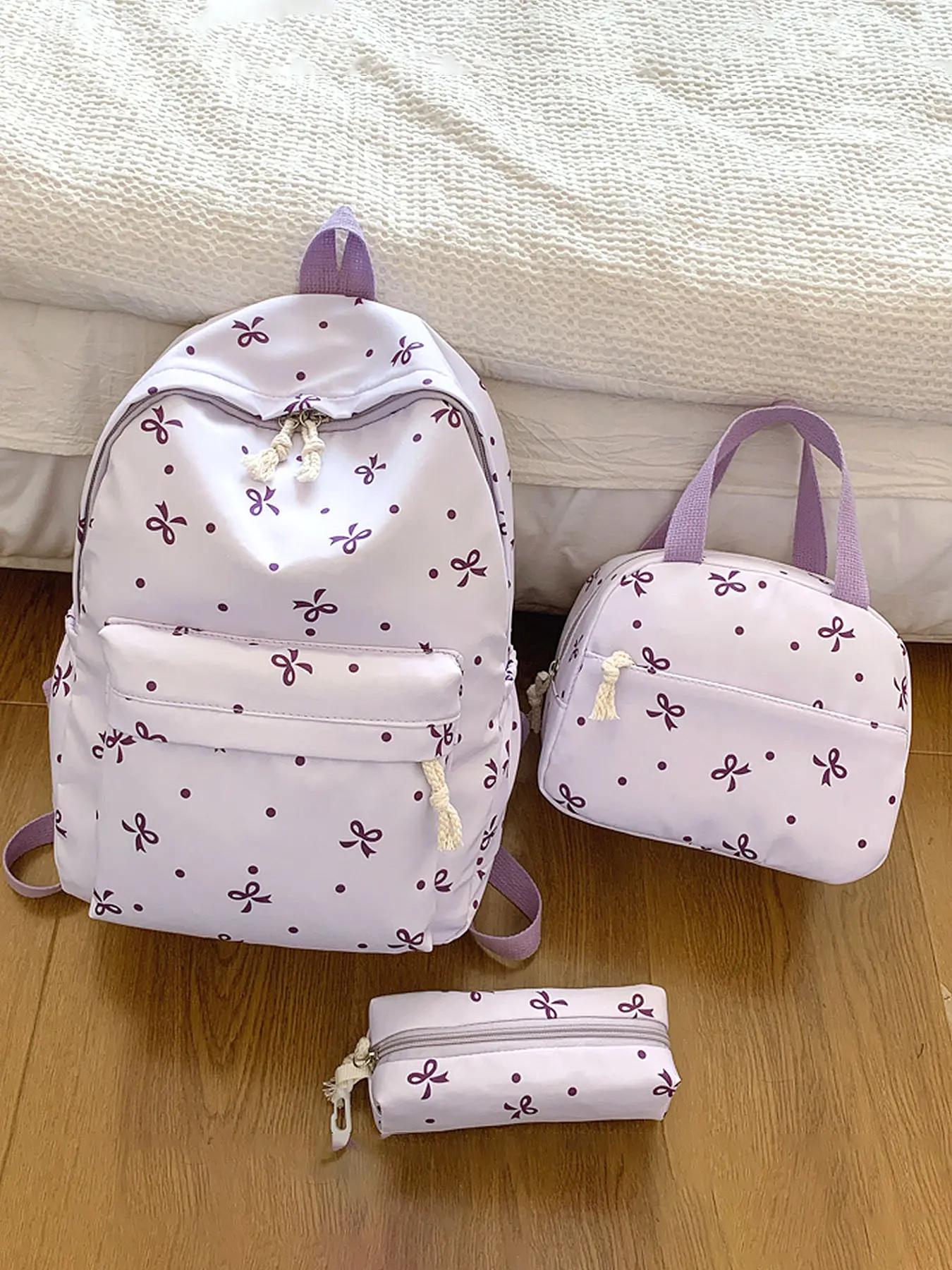 Cute bow print multiple piece girls' backpack, light purple polka dot school backpack with lunch bag and pencil case, lightweight backpack, casual daily backpack for teenage girls' school, travel, campus, and back to school seasons